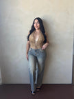 Front view of model wearing Vintage Wash Low Rise Wide Leg Jeans